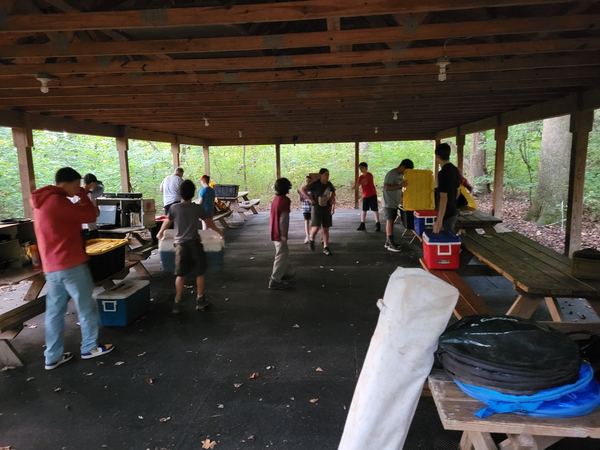 Troop gathered under the pavilion for camp meals